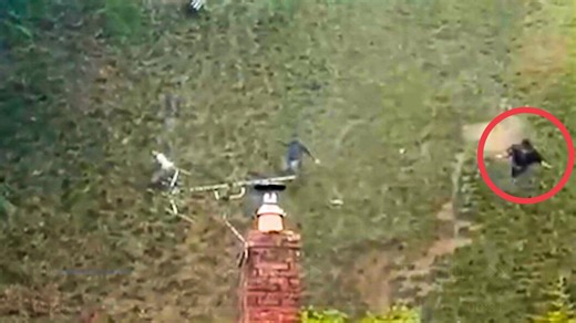 Man goes flying down hill chasing cheese in annual Cheese Rolling competition