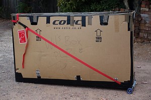 The Bike Box Roller converts your cardboard box into a travel case on wheels