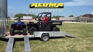 The Aluma 8115-WD (wood deck) has 3 access points with the Bi-Fold Tailgate, removable side ramps/sides and tilt down salt shield. | Aluma Trailers