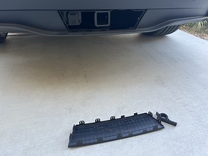 What is the difference between Tow Hitch ($1000) and Tow Package ($1300) on Model Y