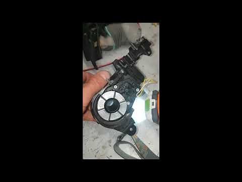 Disassembly of a folding electric rearview mirror axle spring