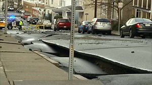 ‘A huge crater’: Massive water main break floods Fall River streets, shreds asphalt