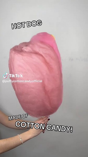 IT’S A HOT DOG! This juicy frank is made entirely of freshly spun cotton candy — who wants a bite? #hotdog #cottoncandy #art #fyp