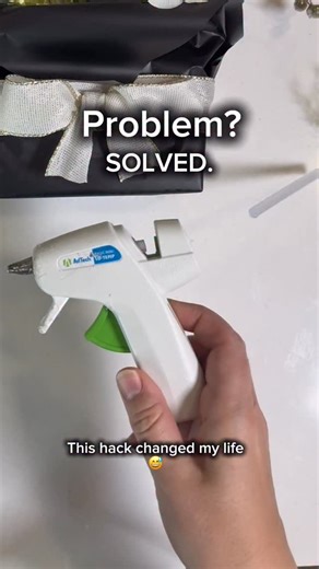 Melissa on Instagram: "Hot glue sticks falling out is the most annoying part of using a glue gun — and this fixes it. A tiny dab of glue keeps the new glue stick from slipping or wobbling while you work. Save this hot glue gun hack for your next craft or DIY project. #hotgluegun #craftingtips #crafthack"