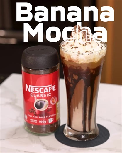 Dive into the Banana Coffee revolution with Banana Mocha! This dreamy mix of ripe bananas, mocha magic, and Nescafé is your new obsession. Smooth, chocolatey, and refreshing! Who's blending this ASAP? 👇 #Nescafé #BananaCoffee | NESCAFÉ