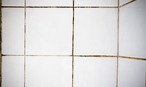 Express tests out baking soda hack to clean grout between tiles