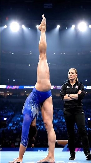 Gymnast Performs Extreme Leg Raise on Competition Floor