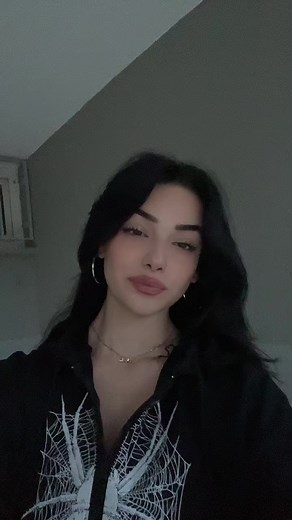 Fashion Statement: Black Hoodie with Spider Web Design