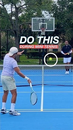 Why You Should Read the Print on the Tennis Ball During Mini Tennis Warm-Up