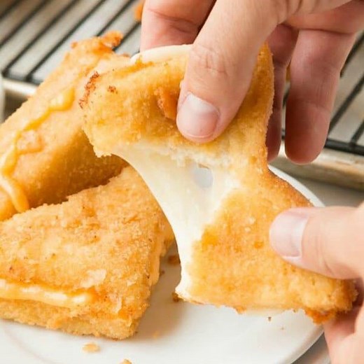 Looking for a classic mid-western recipe? These CHEESE FRENCHEES DEEP FRIED GRILLED CHEESE are a favorite for the super bowl! RECIPE: https://ohsweetbasil.com/cheese-frenchees-deep-fried-grilled-cheese-recipe/ PIN: https://www.pinterest.com/pin/412431278368224816/ | Sweet Basil