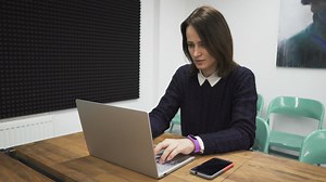 Typing alone in the office - Free Stock Video