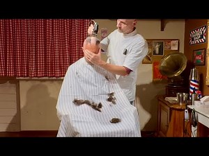 Recruit shaved smooth by the barber
