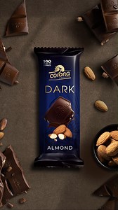 Two flavors, one pure joy! Dive into the rich world of Corona chocolate with almonds and hazelnuts. طعمين وسعادة ملهاش حدود! استمتع بطعم شوكولاتة كورونا الغني باللوز والبندق. #coronavirus #pure_joy #chocolate | Corona كورونا