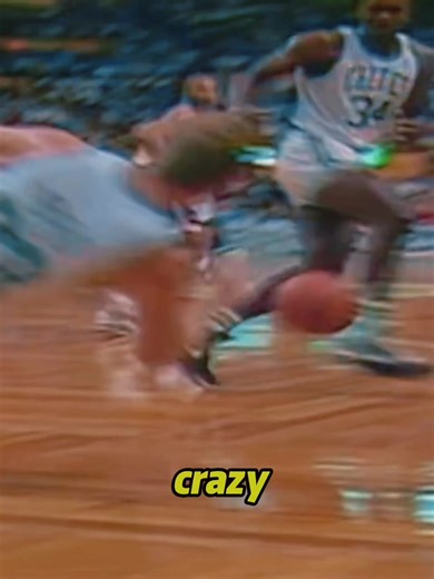 Larry Bird's Iconic Basketball Shot in Slacks