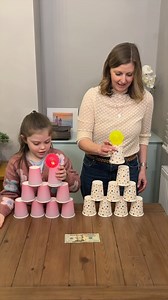 26K views · 600 reactions | First person to stack the cups wins 朗 Family members compete to win prizes by seeing who can stack all the cups together first, but you can only use one hand, and you must keep the ball on top of the top cup the entire time! What's the best strategy? #prizegames #prizes #games #cups #stacking #family #fun | Rob And Elizabeth | Facebook