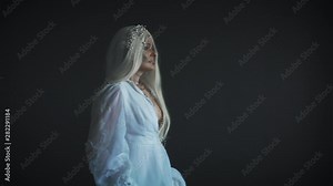 The corpse of the bride rose on the day of the celebration of the day of the dead to meet with her friends, relatives and loved ones. The ghost of a woman in a white vintage wedding dress is walking