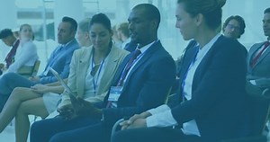 Animation of data processing over diverse businesspeople using digital tablet at business conference. Computer interface and business technology concept