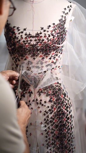 The fully embellished jumpsuit in skin-tone silk tulle features a beautifully draped silk organza bodice and an accompanying shawl. By @ramialaliofficial ❤️ | CoutureNotebook