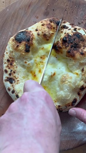 Cheese bread , pizza what ever you want to call it. It’s puffy, cheesy goodness. #pizza #cheese #bread #homemade #pizzalover #bakingsteel