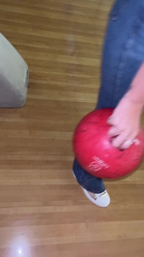 Bowling Fun: Young Woman's Perfect Roll