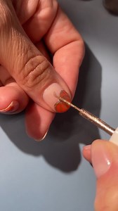How to easily create a pumpkin accent nail 🎃✨ Colors used: Dream, Sunset Escape, Gladiator Bronze @polish.lab.rat #ellamila #artistera #halloweennails #nailart | Ella Mila