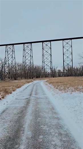 Chelby the adventure pup on Instagram: "Have you ever travelled to lethbridge AB? The longest and highest railway trestle bridge in Canada, and the world, is the Lethbridge Viaduct (High Level Bridge) in Lethbridge, Alberta, spanning the Oldman River at 1,624 meters (over a mile) long and 96 meters (314 feet) high, built by Canadian Pacific Railway in 1909 to improve rail lines. #oldmanriver #highlevelbridge #lethbridgealberta #bostonterrier #wintertrail"