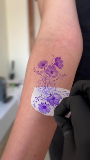 Delicate Floral and Anatomical Heart Tattoo Artistry