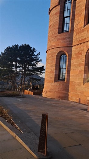 A beautiful evening view from the castle gate, looking down the River Ness, with a soft sunset glow over the city. | Inverness Outlanders