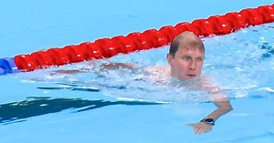 'Bob the Cap Catcher' saves the day at the Paris Olympics swimming heat