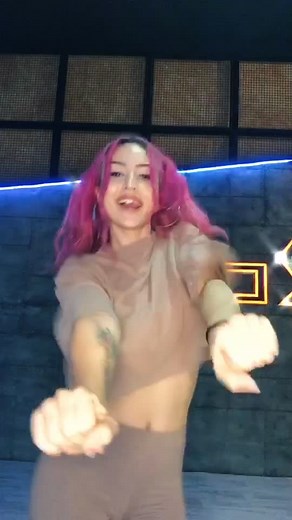 Dance Routine in Neon Lighting Ambiance