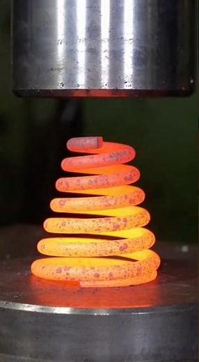 Metal press vs. conical molten steel spring 🔥