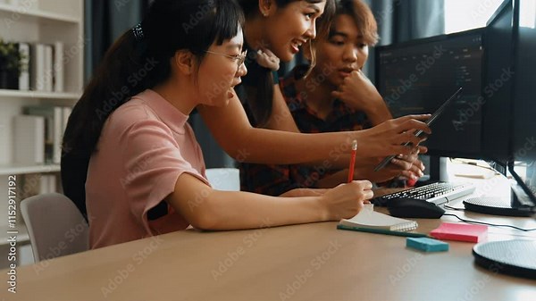 Slow motion back end software developer engineer for computer programming working together on debugging writing computing code, solving complex algorithms display on monitor in office. Burgeoning