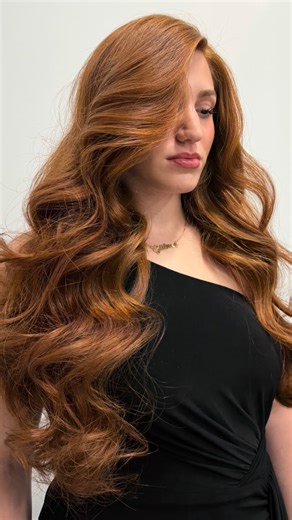 Créé PROFESSIONAL on Instagram: "Big fluffy WAVES for @gulnurarsllann Preped with exclusively@cree #LiftedThickeningSpray Styled with 1 1/4 inc iron curled away from the face Brushed out with touch of #WonderfulBlendOil"