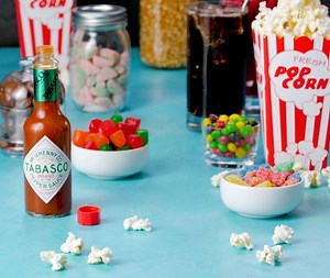 Set up a snack bar for your at-home work force. Grab some bowls of popcorn a bottle of TABASCO® Sauce. | Tabasco