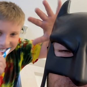 I didn't want you to find out my secret identity this way! But at least Ben's safe from g i n g i v i t i s... | Batdad