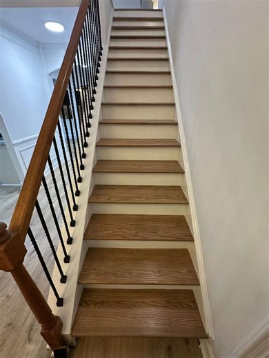 ✨ Project Completed! ✨ Our team completed a full demo throughout the home, removing laminate, glue-down hardwood, carpet, and tile to prepare for a fresh installation. For the new flooring, we installed premium Mohawk products featuring: • Fresh Grain Oak • 10 mm thickness • 20 mil wear layer • Made in the USA • Underlayment installed on the first floor In the bedrooms, we added 40 oz carpet in the color Sand to create a warm and comfortable feel. For the staircase, we removed all carpet, reinfo