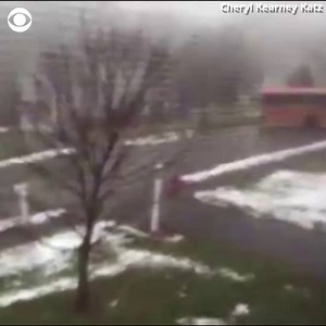 Frightening video shows a school bus filled with kids sliding down an icy street in Massachusetts and hitting a car. Fortunately, no one was injured. http://cbsn.ws/2BplYDf | CBS News