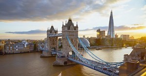 timelapse London skyline with illuminated Tower bridge in sunset time, UK