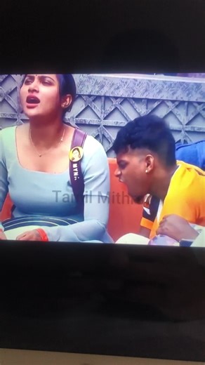 Engaging Group Conversation on a Red Couch