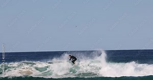 Gold Coast, Australia. November 22, 2022. Surfers at a popular beach in Surfers Paradise.