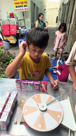 The whole group tried the challenge of spinning the wheel to win milk cake #xuhuongyoutube ￼