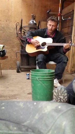 Acoustic Guitar Performance in Rustic Setting