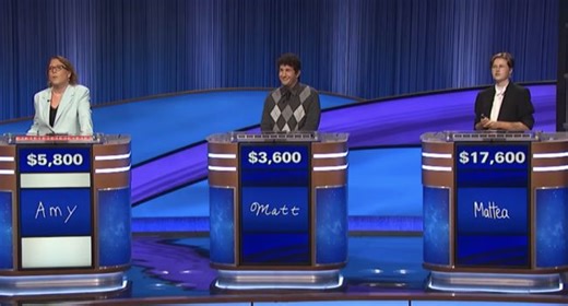 The 2022 Tournament of Champions exhibition match brought together three of the most dominant players in modern Jeopardy! history: Mattea Roach, Matt Amodio, and Amy Schneider. Each came in with a reputation — big streaks, bold strategies, near-perfect control. But this time, no one had the upper hand. It wasn’t about running away with the game… it was about keeping up.