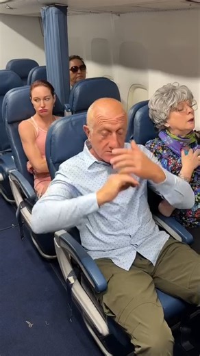 Woman climbs over seat on plane 🎬 This video was produced by Network Media and Penny Wiggins | Comedy Tomorrow Tragedy Tonight