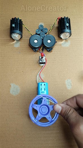 Powering 2 fog LED and 6 buzzers with a metal gear motor #DIYProject #Tech #Innovation