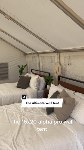 Have you seen our alpha pro wall tent? This tent features roll up doors, two stove jacks, an AC port and more! #glamping #walltent #tenttour #canvastent