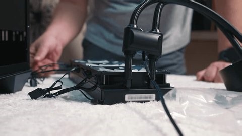 clip-3964990927-preparing-liquid-cooling-system-installation-into-computer