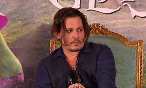 We're only noticing Johnny Depp's teeth now...