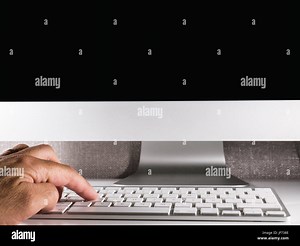 Man working on modern computer video editing desk setup Stock Photo - Alamy