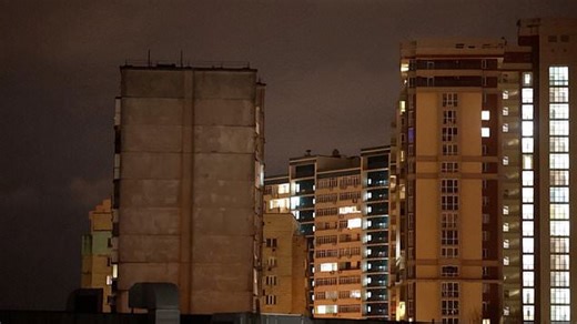 Air raid sirens ring out over Kyiv as explosions light up sky